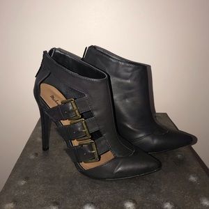 Michael Antonio stiletto booties w/stylish buckles